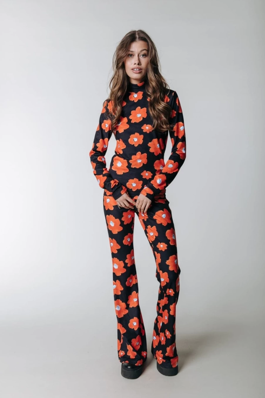 Colourful Rebel Women's Peach Flare Pants in Mandarin Orange - Floral Print High Waist Trousers